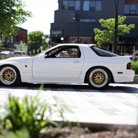 White 1988 Mazda RX-7 on Gold JNC 005