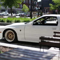 White 1988 Mazda RX-7 on Gold JNC 005