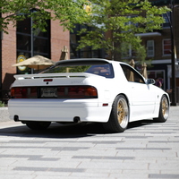 White 1988 Mazda RX-7 on Gold JNC 005