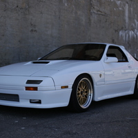 White 1988 Mazda RX-7 on Gold JNC 005