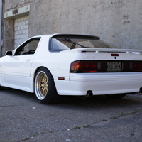 White 1988 Mazda RX-7 on Gold JNC 005
