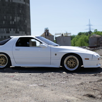 White 1988 Mazda RX-7 on Gold JNC 005