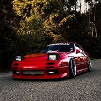 Red 1991 Mazda RX-7 on Bronze Riverside Altstadt