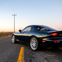 Blue 1993 Mazda RX-7 on Silver/Chrome Enkei Lusso