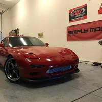 Red 1993 Mazda RX-7 on Silver/Chrome Varrstoen ES2