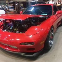 Red 1993 Mazda RX-7 on Silver/Chrome Varrstoen ES2