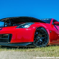 Red 2007 Nissan 350Z on Black Enkei Raijin