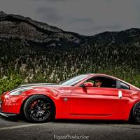 Red 2007 Nissan 350Z on Black Enkei Raijin