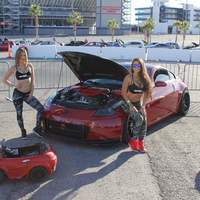 Red 2007 Nissan 350Z on Black Enkei Raijin