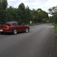 Orange 1995 Nissan Silvia on White Nismo LM GT2
