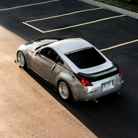 Silver/Chrome 2003 Nissan 350Z on Silver/Chrome Avant Garde M220