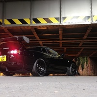 Black 1993 Toyota Supra on Black Rota Grid Drift