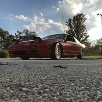 Red 1990 Nissan 240SX on Silver/Chrome BBS LM