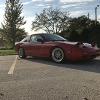 Red 1990 Nissan 240SX on Silver/Chrome BBS LM