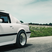 White 1985 Mazda RX-7 on Silver/Chrome Belak Series2