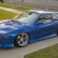 Blue 1993 Nissan Silvia on Silver/Chrome Work VS-KF