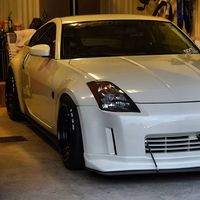 White 2003 Nissan 350Z on Black Cosmis XT-206R