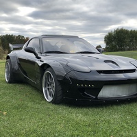 Black 1994 Mazda RX-7 on Gray Forgeline ZX3P