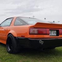 Orange 1989 Toyota Supra on Black Pro Comp Xtreme Series 52