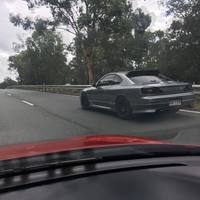 Gray 1999 Nissan Silvia on Black Rota Grid Drift