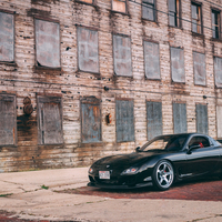 Black 1993 Mazda RX-7 on Silver/Chrome Advan Racing TCIII