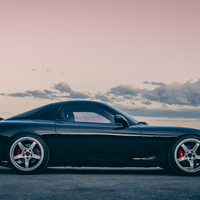 Black 1993 Mazda RX-7 on Silver/Chrome Advan Racing TCIII