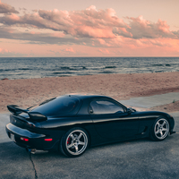 Black 1993 Mazda RX-7 on Silver/Chrome Advan Racing TCIII