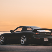 Black 1993 Mazda RX-7 on Silver/Chrome Advan Racing TCIII
