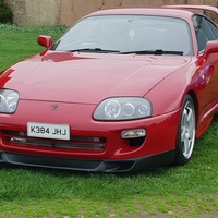 Red 1993 Toyota Supra on Silver/Chrome Rota GTR