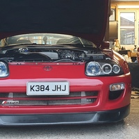 Red 1993 Toyota Supra on Silver/Chrome Rota GTR