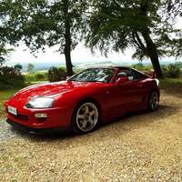 Red 1993 Toyota Supra on Silver/Chrome Rota GTR