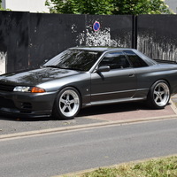 Gray 1991 Nissan Skyline GTR on Silver/Chrome Panasport G7-C5C