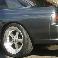 Gray 1991 Nissan Skyline GTR on Silver/Chrome Panasport G7-C5C