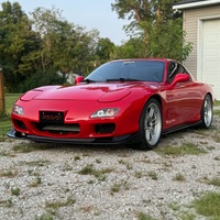 Red 1993 Mazda RX-7 on Silver/Chrome Enkei RPF1
