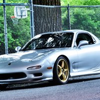 Silver/Chrome 1993 Mazda RX-7 on Gold OZ Racing Crono HT