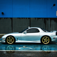 Silver/Chrome 1993 Mazda RX-7 on Gold OZ Racing Crono HT