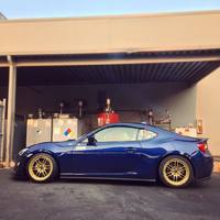 Blue 2015 Scion FR-S on Gold Enkei RPF1